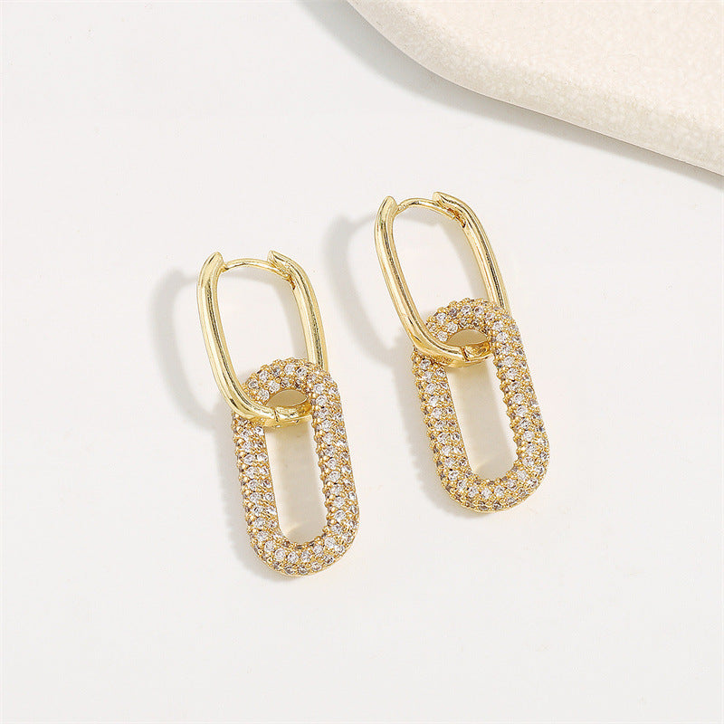 Rectangular link drop earrings styled