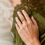Sculptural wrap open ring styled