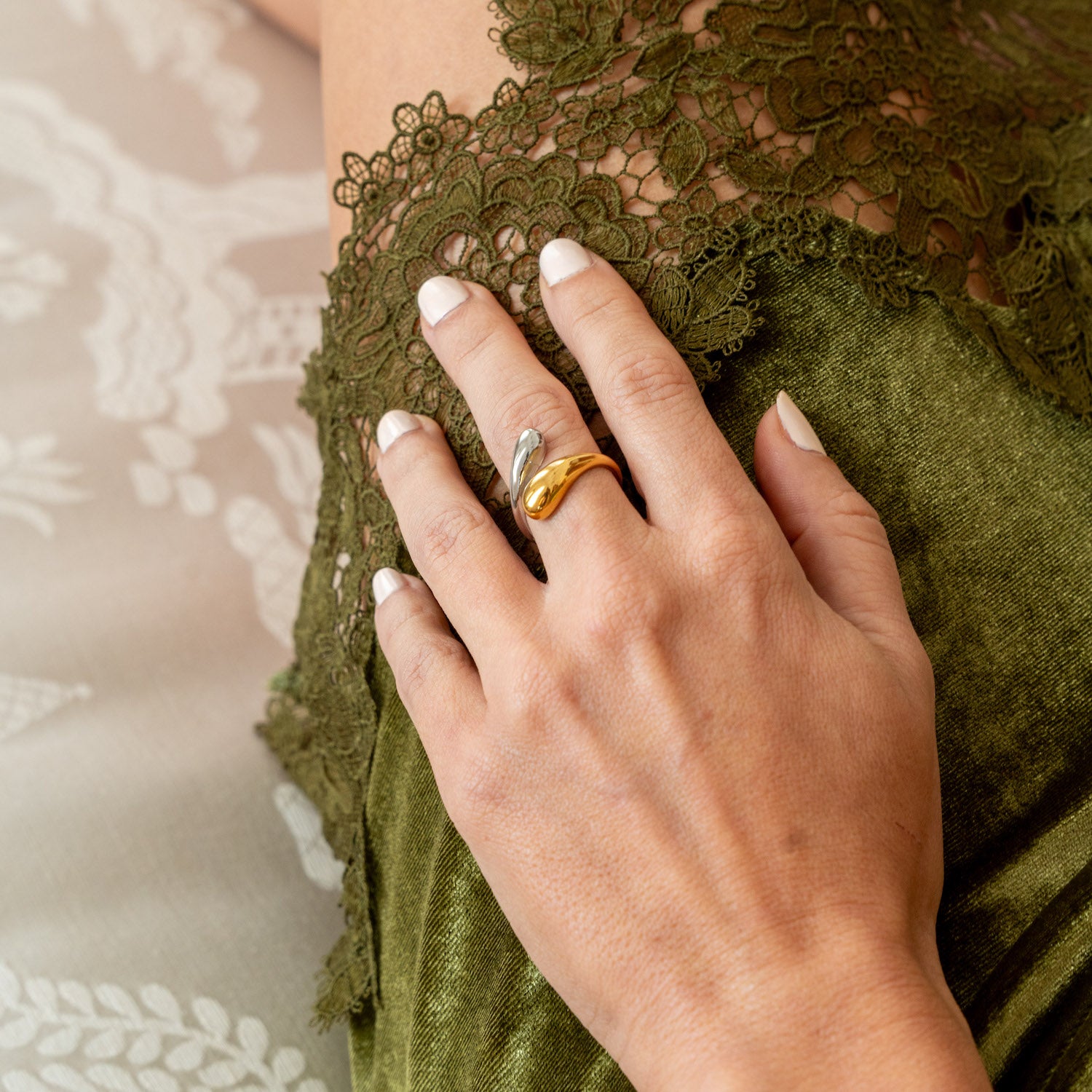 Sculptural wrap open ring styled