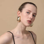 Teardrop earrings styled
