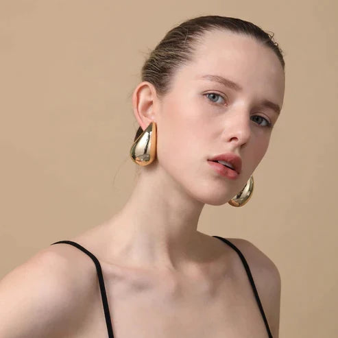 Teardrop earrings styled