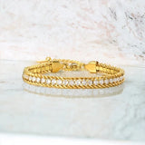 Gold tennis bracelet stone detail