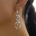 Sunbeam Spiral Earrings in white gold
