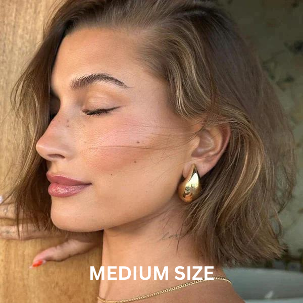 Teardrop earrings medium size worn