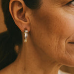 Vintage gold and diamond earrings worn