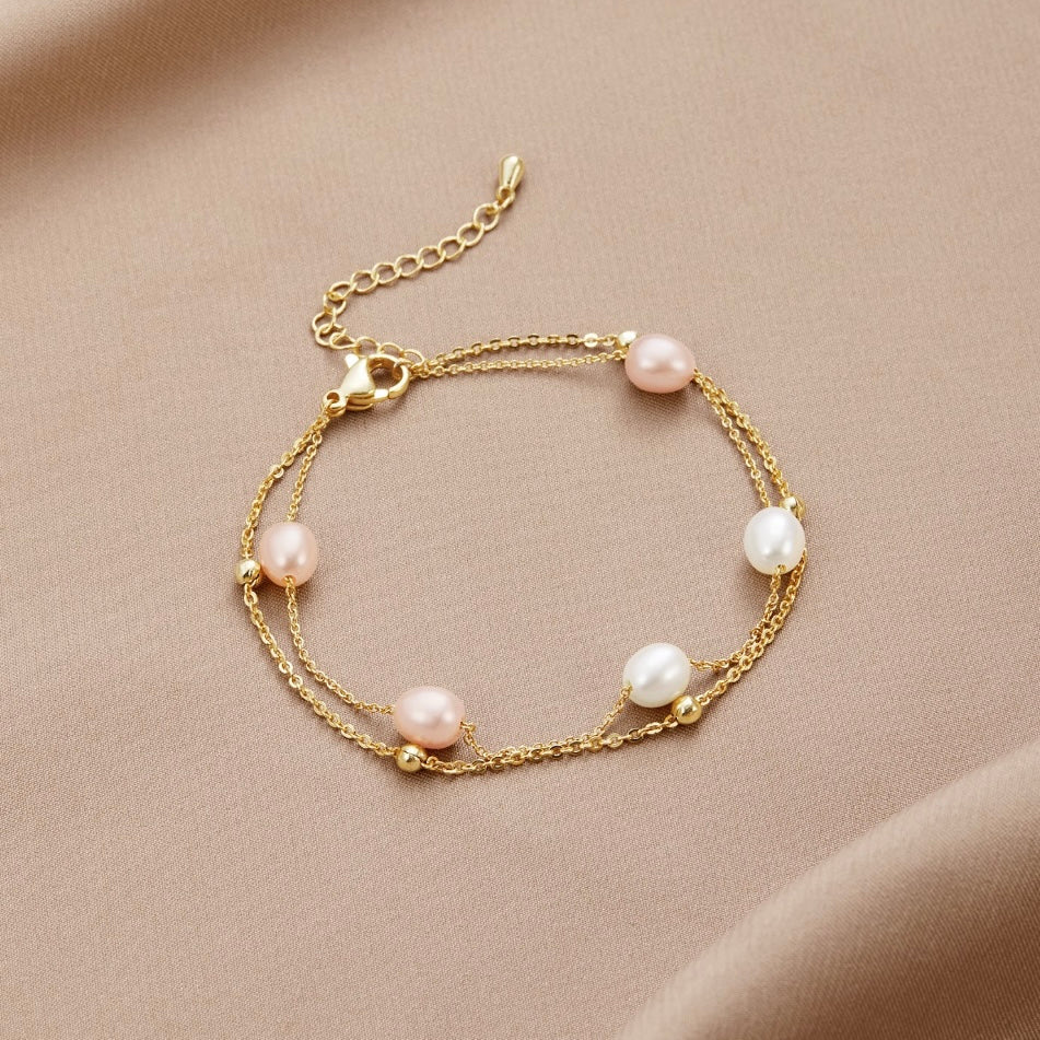 Double Strand Pearl Station Gold Bracelet