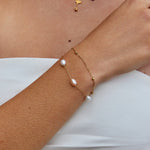 Double Strand Pearl Station Gold Bracelet