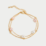 Double Strand Pearl Station Gold Bracelet