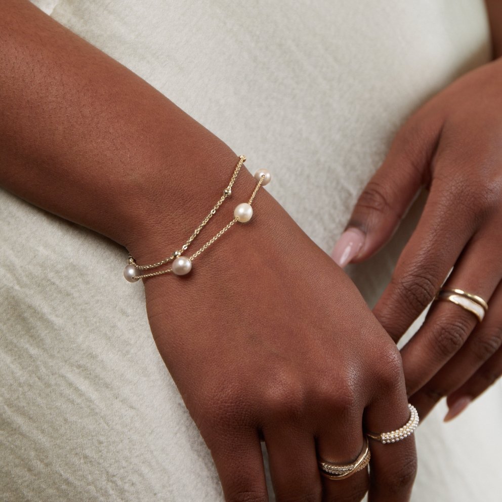 Double Strand Pearl Station Gold Bracelet