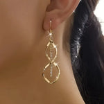 Sunbeam Spiral Earrings in gold