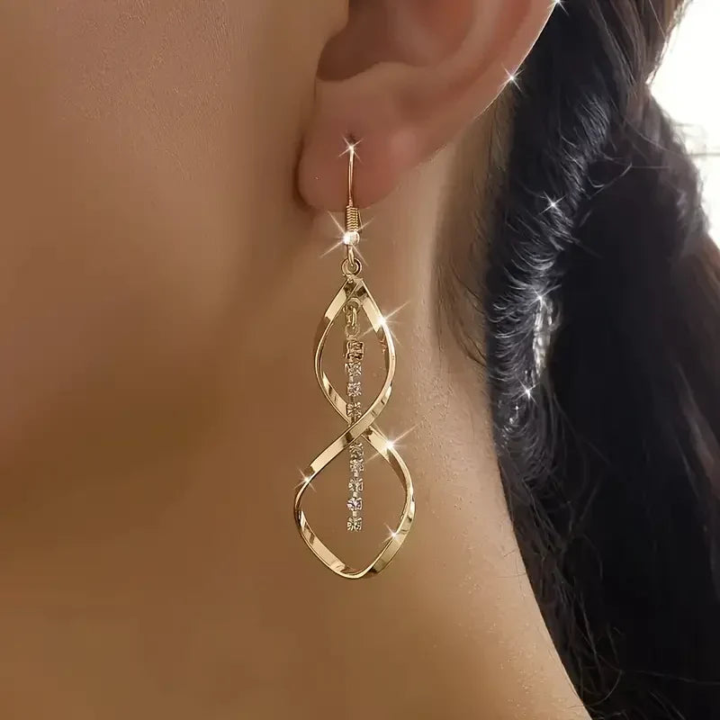 Sunbeam Spiral Earrings in gold