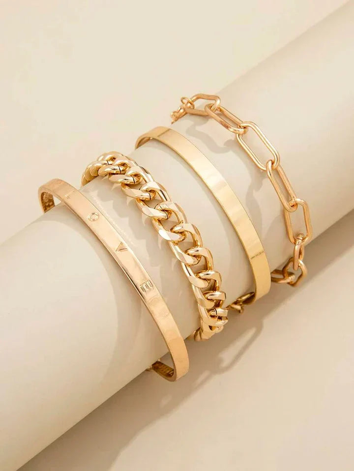 Gold bracelet stack worn